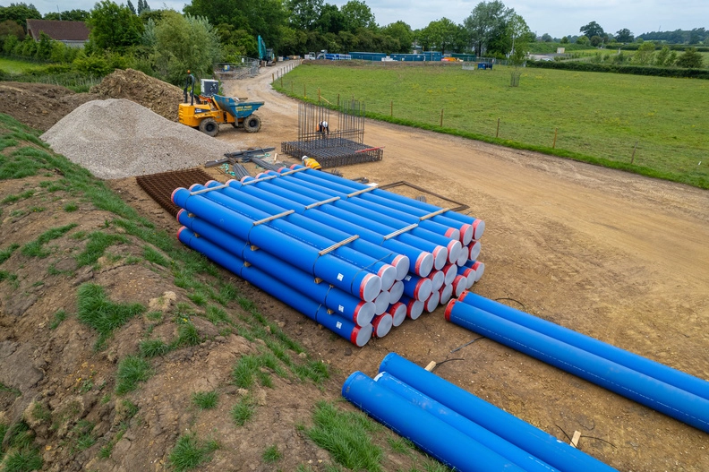 Water mains pipes ready to be laid into the ground